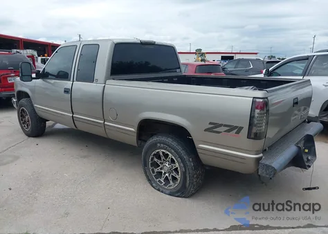 1998 Chevrolet K1500 Fleetside z USA, uszkodzony, nr VIN 2GCEK19R9W1253869